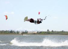 Sport,Action,Kiteboarding,Kite,kiter,Surfing,Water,Water Sport,Lagoon,Jumping,Flying,Stunt,Magic Trick,unhooked,kiteloop,Heat,Beach,Swimwear,Mid-Air,Air Pump